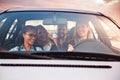 Group of friends having fun in the car Royalty Free Stock Photo