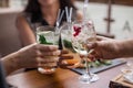 Group of friends having fun and drink cocktails. Royalty Free Stock Photo