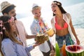 Summer, vacation, party, people concept. Group of friends having fun and party on the beach. Royalty Free Stock Photo