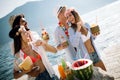 Summer, vacation, party, people concept. Group of friends having fun and party on the beach. Royalty Free Stock Photo