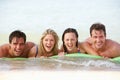 Group Of Friends Having Fun In Sea On Airbed Royalty Free Stock Photo