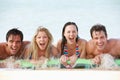 Group Of Friends Having Fun In Sea On Airbed Royalty Free Stock Photo