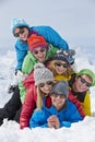 Group Of Friends Having Fun On Ski Holiday In Mountains Royalty Free Stock Photo