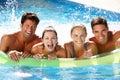 Group Of Friends Having Fun In Swimming Pool Royalty Free Stock Photo