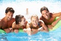 Group Of Friends Having Fun In Swimming Pool Royalty Free Stock Photo