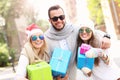 Group of friends holding Christmas presents Royalty Free Stock Photo