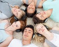 Group of friends listening to music on the floor Royalty Free Stock Photo