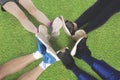 Group of friends make foot circle