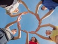 A group of friends makes a circle from the palms of their hands Royalty Free Stock Photo