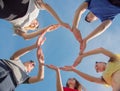 A group of friends makes a circle from the palms of their hands Royalty Free Stock Photo