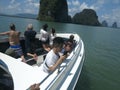 Group of friends making party on a yacht. Happy people having a fancy party on a luxury boat sailing in sea. - Phuket Thailand May Royalty Free Stock Photo