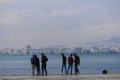 Group of friends meeting at seaside