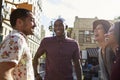 Group Of Friends Meeting On Urban Street In New York City