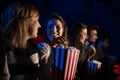 Group of friends in the movie theater Royalty Free Stock Photo
