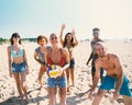 Group of friends playing at beach volley at the beach Royalty Free Stock Photo