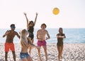 Group of friends playing at beach volley at the beach Royalty Free Stock Photo