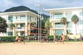 Group of friends playing beach volley - Multi-ethic group of people having fun on the beach