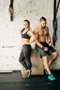 Friends relaxing and taking a break after working out at a cross-training gym Royalty Free Stock Photo