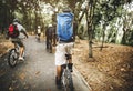 Group of friends ride mountain bike in the forest together Royalty Free Stock Photo