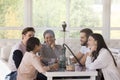 Group of friends smoking shisha, hanging out together Royalty Free Stock Photo