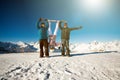 Group friends snowboarders have fun on the slope Royalty Free Stock Photo