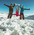 Group friends snowboarders have fun on the slope Royalty Free Stock Photo