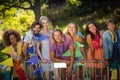 Group of friends standing together in park Royalty Free Stock Photo