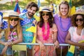 Group of friends standing together in park Royalty Free Stock Photo