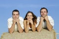 Group of friends on a straw bale