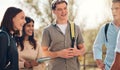 Group of friends, students and conversation outdoor, relax and happy together. Young people, standing in circle and Royalty Free Stock Photo