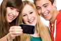 Group of friends taking photo of themselves Royalty Free Stock Photo