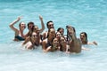 Group of friends taking a selfie to the sea