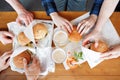 Group of friends toasting beer glasses and eating at fast food - Happy people partying and eating in home garden - Young Royalty Free Stock Photo