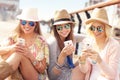 Group of friends using smartphones in the city Royalty Free Stock Photo