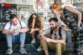 Group of friends using smartphones. Emotional isolation and technology depresion Royalty Free Stock Photo