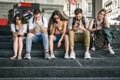 Group of friends using smartphones. Emotional isolation and technology depresion Royalty Free Stock Photo