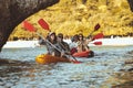 Group friends walk by kayaks kayaking travel Royalty Free Stock Photo