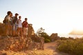 Group Of Friends Walking Along Coastal Path Together Royalty Free Stock Photo