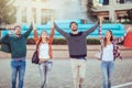 Group Of Friends Walking Along Street With Shopping Bags Royalty Free Stock Photo