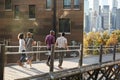 Group Of Friends Walking With Manhattan Skyline In Background Royalty Free Stock Photo