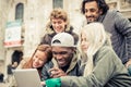 Group of friends watching funny videos Royalty Free Stock Photo