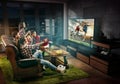 Group of friends watching TV, football match, sport together Royalty Free Stock Photo