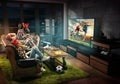 Group of friends watching TV, football match, sport together Royalty Free Stock Photo