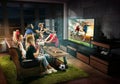 Group of friends watching TV, football match, sport together Royalty Free Stock Photo