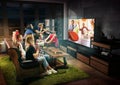 Group of friends watching TV, sport concept, leisure activity Royalty Free Stock Photo