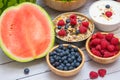 Group Fruits mixed and vegetables with salad bowl, nuts bowl, strawberry, banana, and pineapple, orange juice,  vitamin c in food Royalty Free Stock Photo