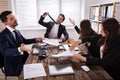 Group Of Frustrated Businesspeople In Meeting Royalty Free Stock Photo