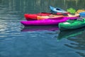 Fullcolors canoes waiting to go sailing on the lake