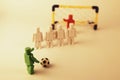 Generic figures recreating a penalty shootout in soccer