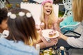 Sweet Moments of Friendship: Girls Having Fun and Indulging in Muffins at Bachelorette Party